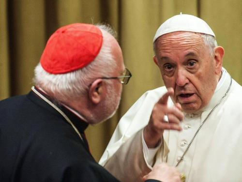 NO FRANCE - NO SWITZERLAND: October 9, 2018 : Pope Francis talks with Card. Reinhard Marx during the afternoon session of the Synod of Bishops on the theme Young people, faith and vocational discernment at the New Hall of the Synod in the Vatican. 9 ottob